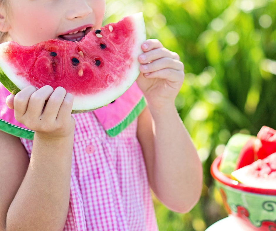 child eating a water melon